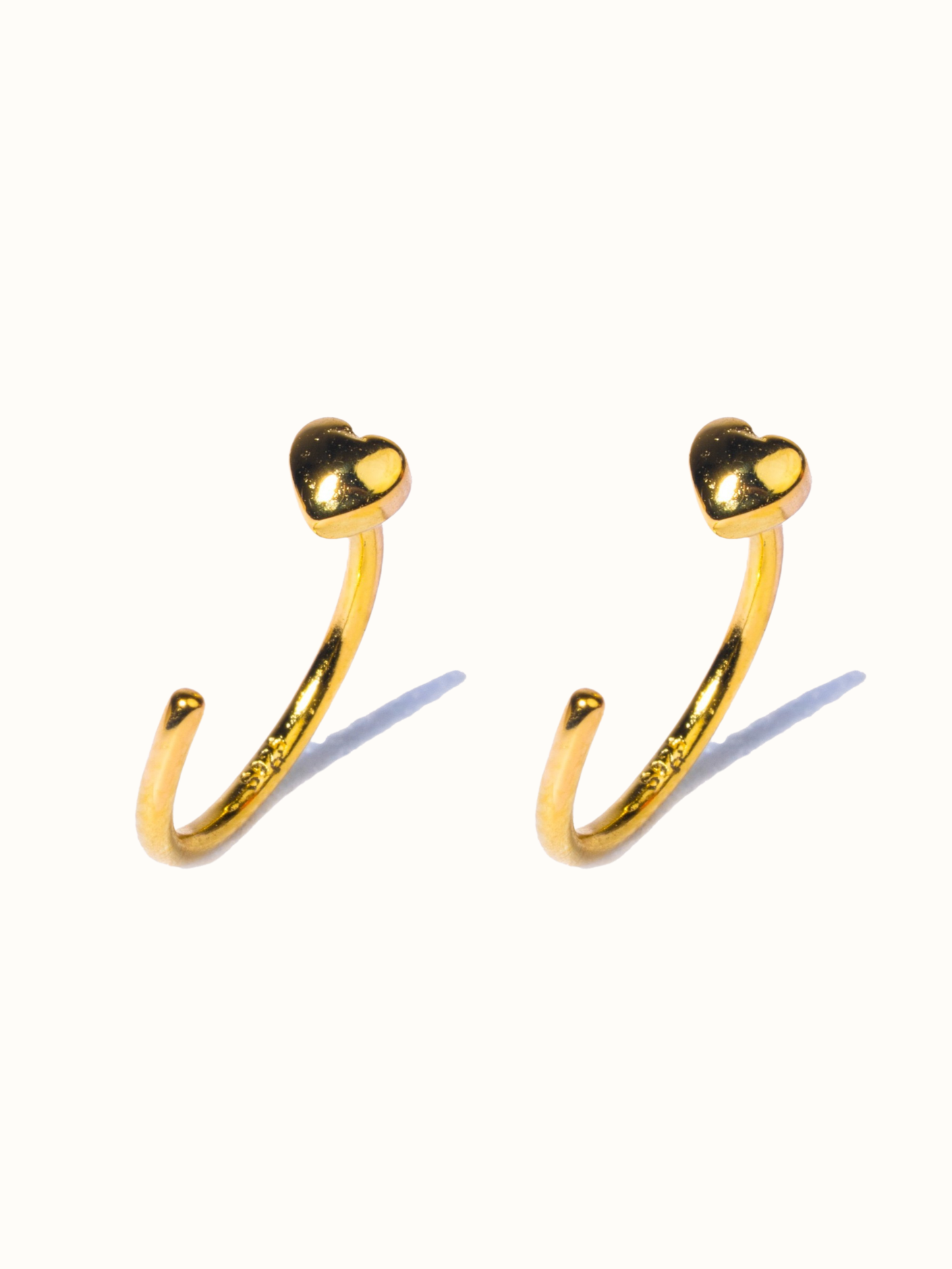 925 sterling silver heart hoop earrings — poke-free hypoallergenic hoops, anti-tarnish and waterproof. Sleep-safe for kids and gentle for sensitive ears.