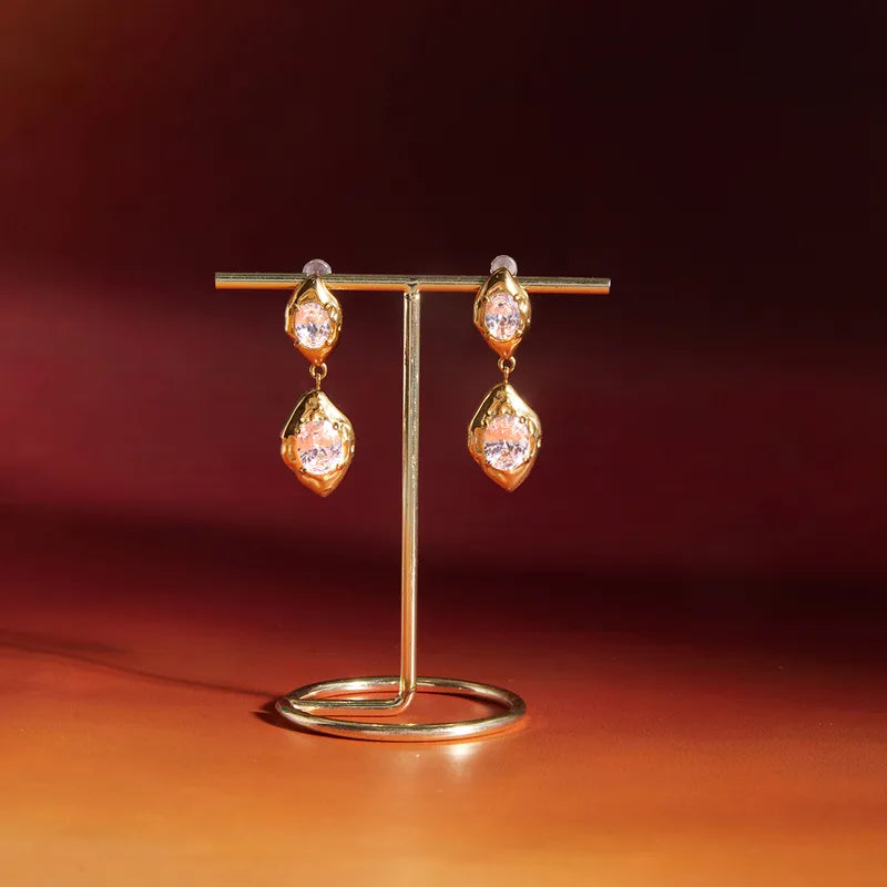 Gold stone drop earrings detail — statement 18k gold-plated drops for ethnic and party outfits.