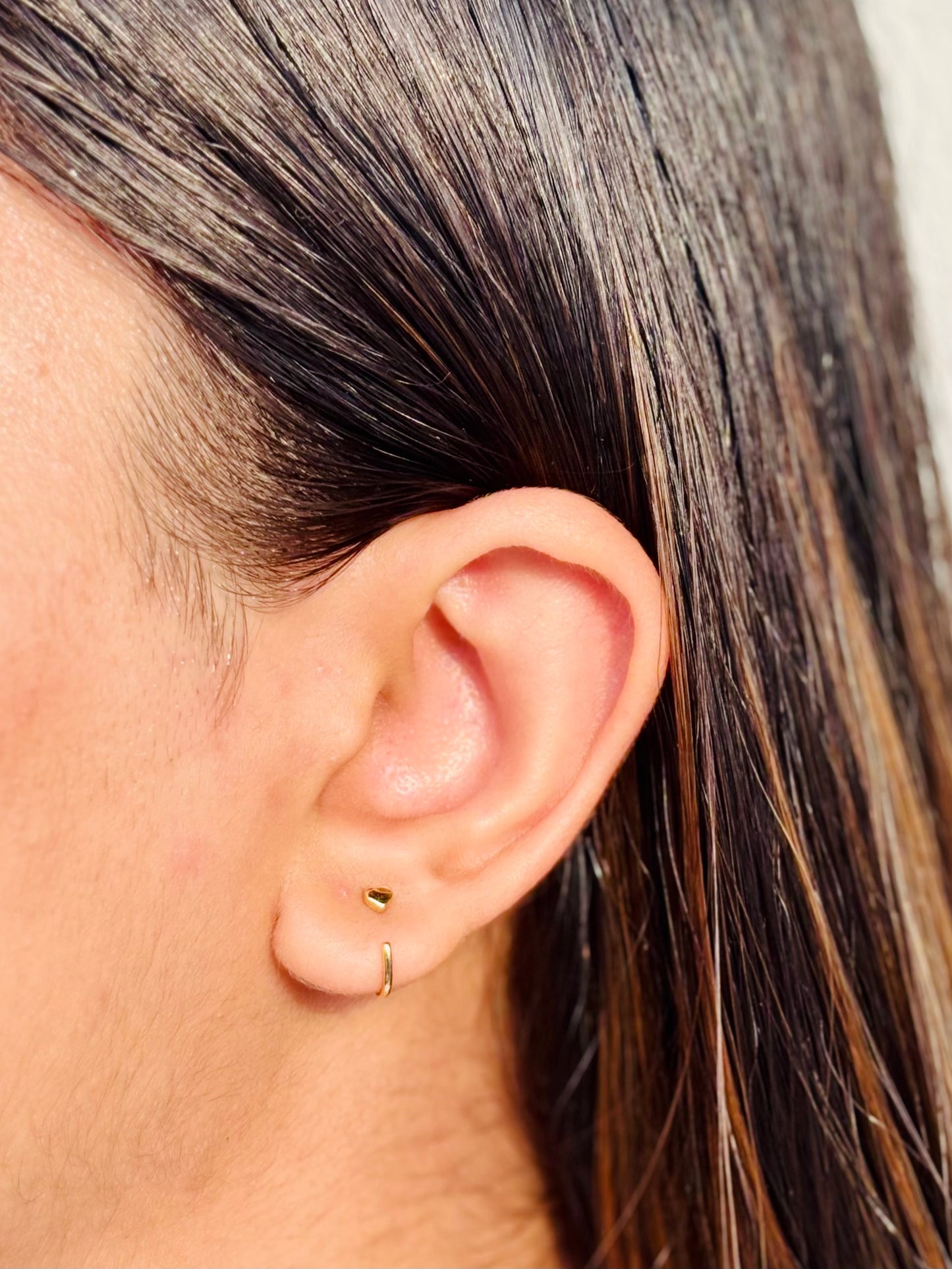 Pair of 925 sterling silver heart hoop earrings — minimalist heart hoops styled for casual office and gifting.