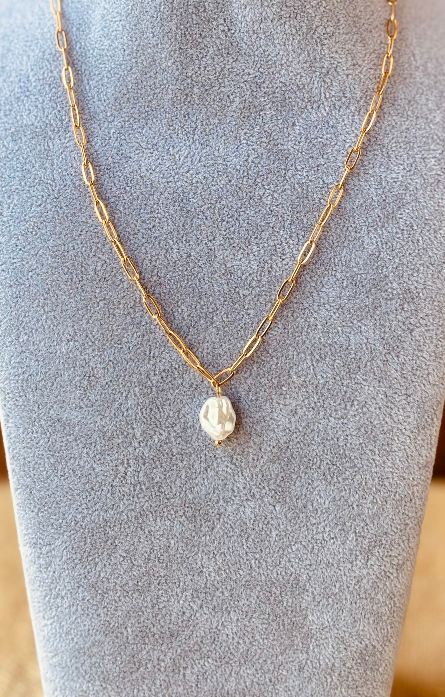 Styled view of Aura pearl chain necklace — 18k gold-plated delicate freshwater pearl pendant for office and gifting.