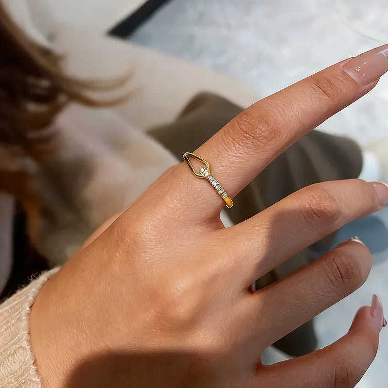 Close-up of statement gold ring — 18k gold-plated bold statement ring for evening and gifting.