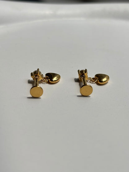 Close-up of heart drop flat-back stud earrings — 18k gold-plated sleep-friendly heart drop studs for casual wear.