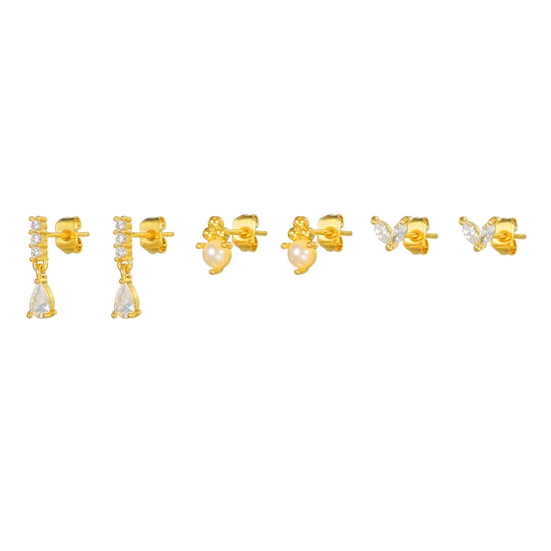 Styled view of stone drop piercing set — 18k gold-plated curated earring set for layered ear styling.