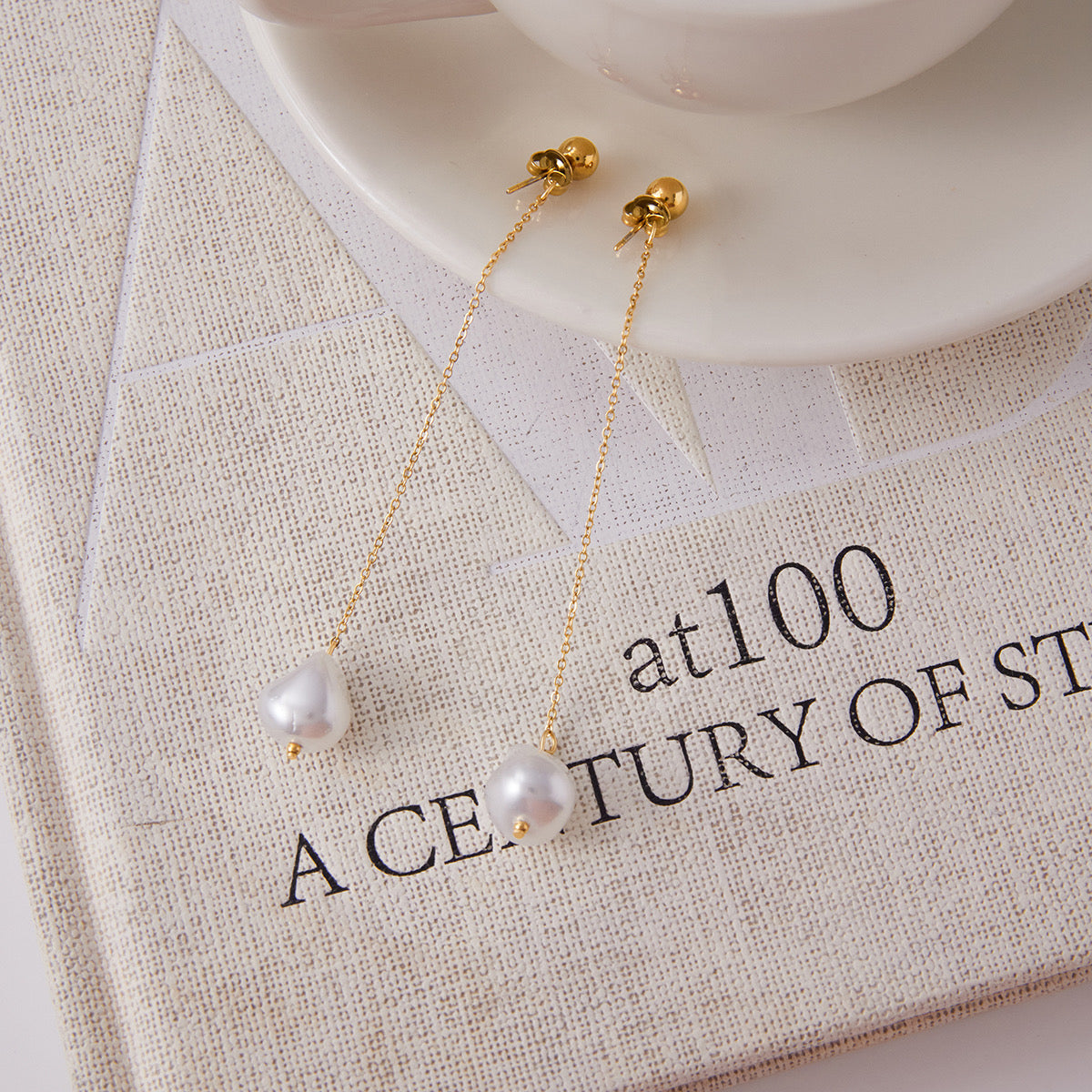 Pair of 18k gold-plated pearl drops styled view — elegant pearl earrings for bridal and gifting.
