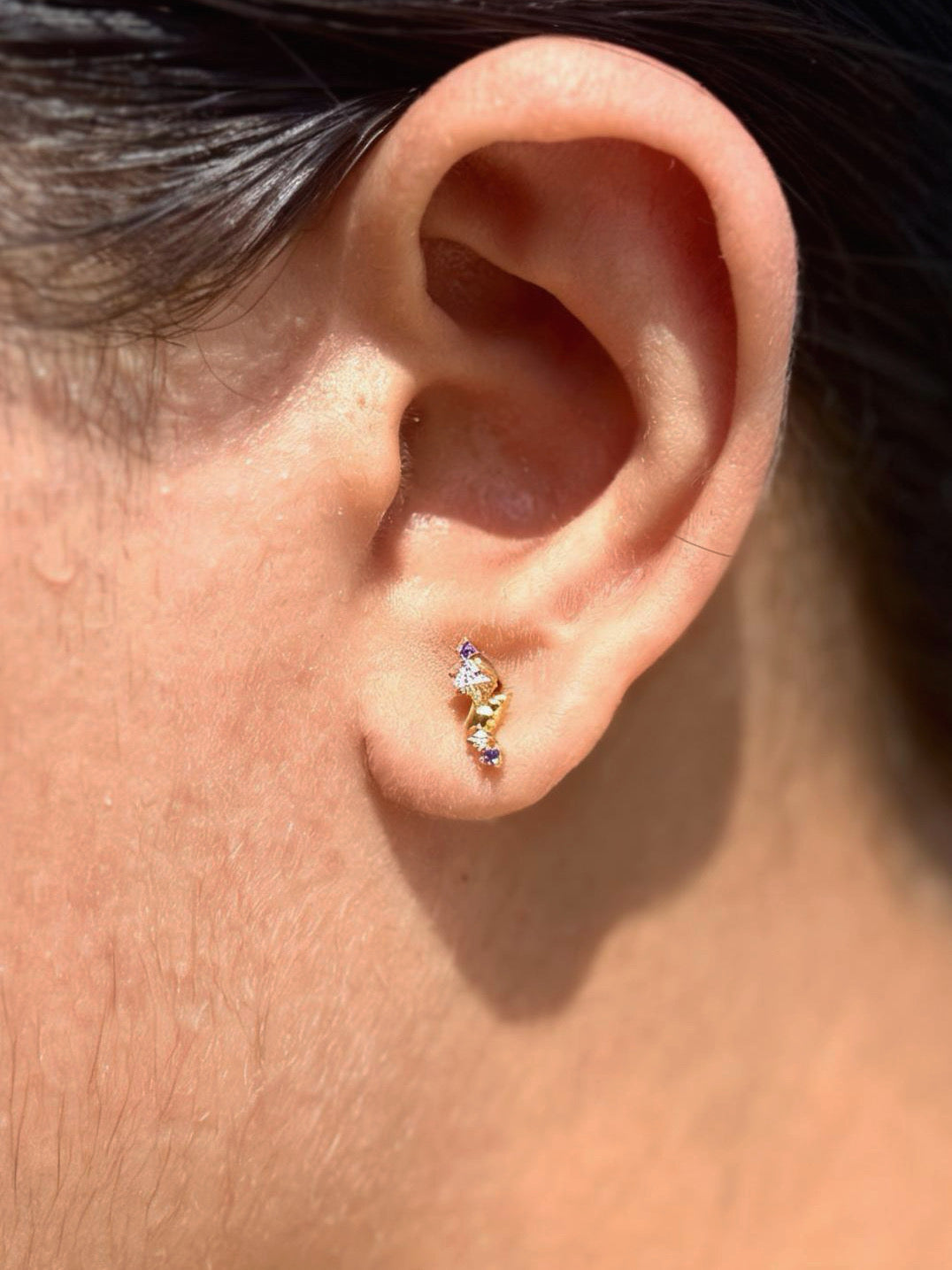 Close-up of colourful ball-back stud earrings — 18k gold-plated playful sleep-friendly studs for casual wear.