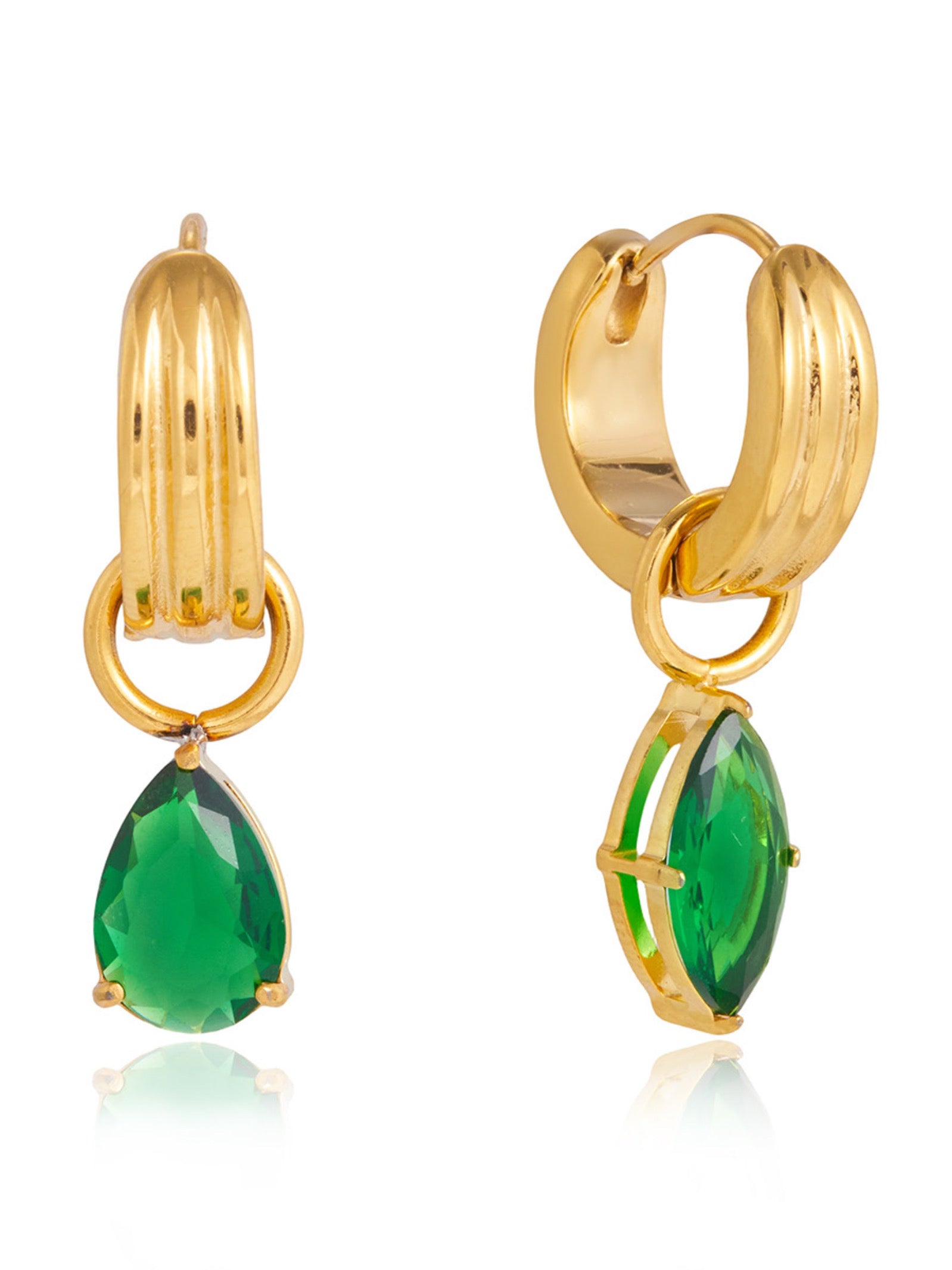 Gold hoop earrings with green gemstones on a white background