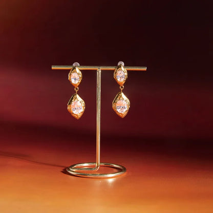 Gold stone drop earrings detail — statement 18k gold-plated drops for ethnic and party outfits.