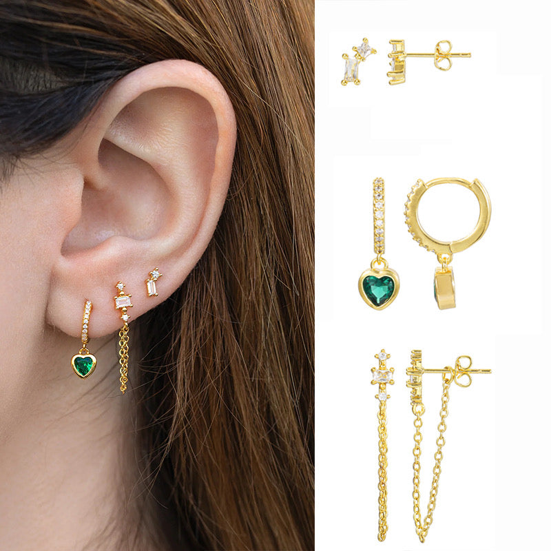 Styled view of green heart piercing set — 18k gold-plated curated earring set for layered ear styling and gifting.
