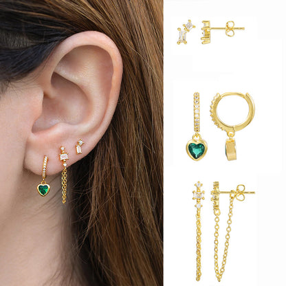 Styled view of green heart piercing set — 18k gold-plated curated earring set for layered ear styling and gifting.