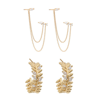 Pair of gold-plated dual piercing earrings — curated set for everyday styling and layered ear stacks.