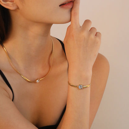 Styled view of Vira layered necklace — 18k gold-plated layerable everyday necklace for casual styling and gifting.
