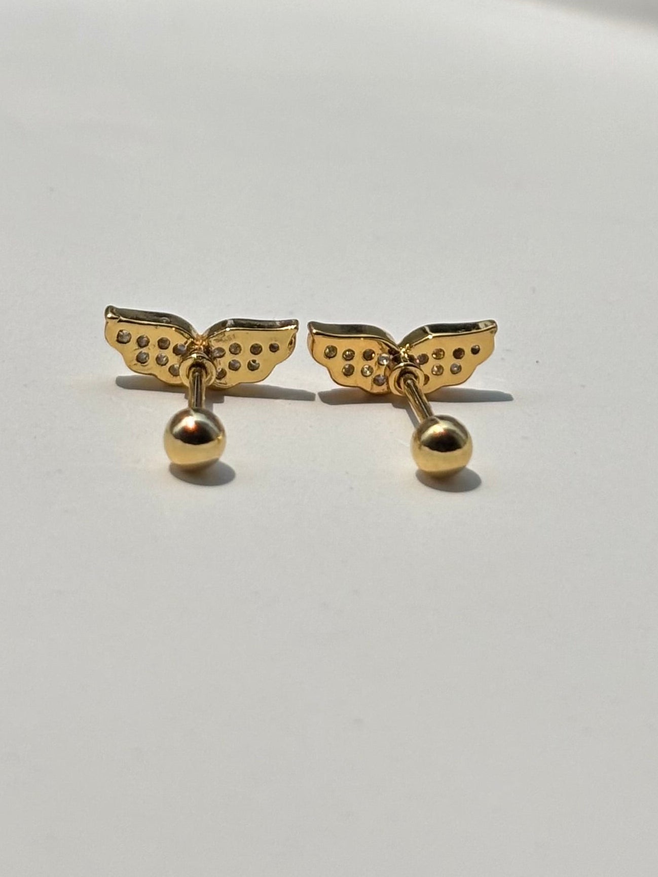 Pair of wing ball-back studs — 18k gold-plated wing stud earrings for everyday styling and gifting.