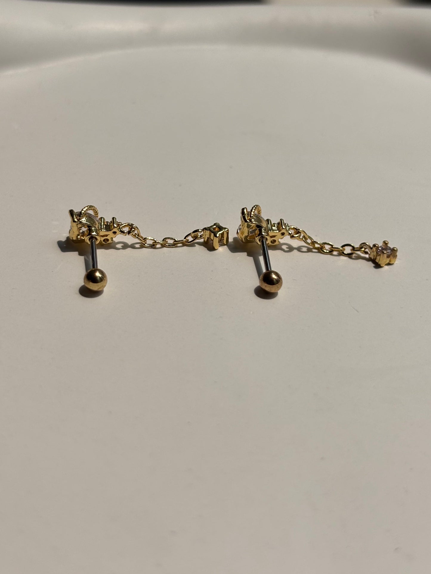 Close-up of stone drop ball-back stud earrings — 18k gold-plated sleep-friendly stone drop studs for casual wear.