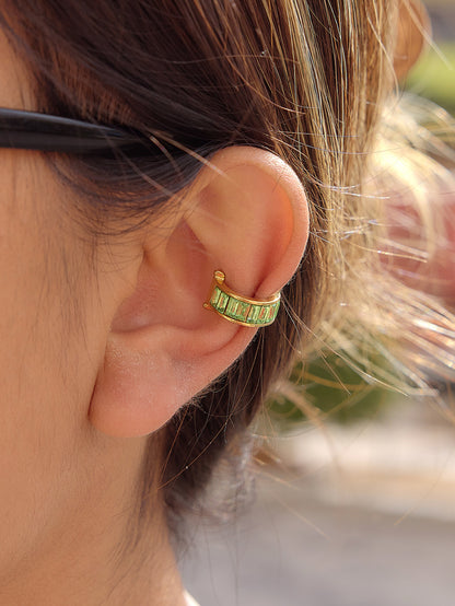 Styled view of Ari ear cuff — sleek 18k gold-plated no-piercing single-piece cuff for festive and everyday looks.