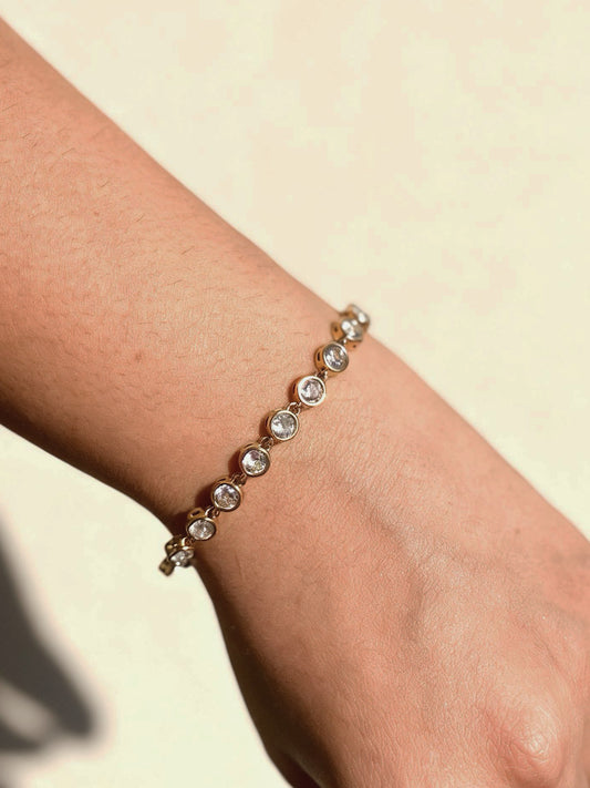 18k gold-plated bezel tennis bracelet — sleek durable bezel-set tennis bracelet, anti-tarnish and waterproof for everyday and evening wear.