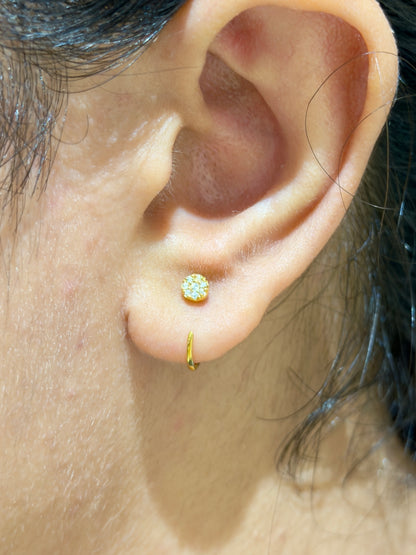 Styled view of 925 sterling silver zircon sparkle earrings — poke-free sparkle studs for everyday, evening, and sleep-safe wear.