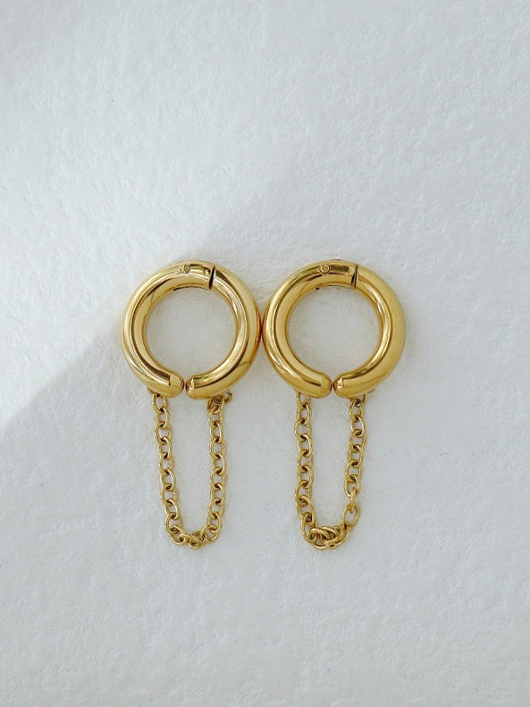 Styled view of Naya gold ear cuff — sleek 18k gold-plated no-piercing single-piece cuff for festive ear stacks.