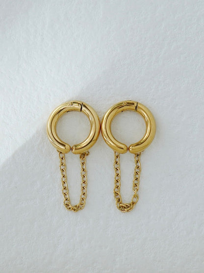 Styled view of Naya gold ear cuff — sleek 18k gold-plated no-piercing single-piece cuff for festive ear stacks.