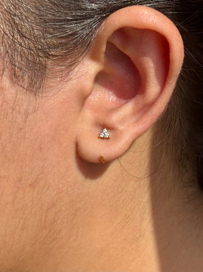 Close-up of triangle comfy hoop earrings — poke-free hypoallergenic geometric hoops, sleep-safe for kids and sensitive ears.
