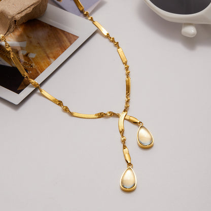 Styled view of Vila lariat necklace — 18k gold-plated lariat for evening and gifting.