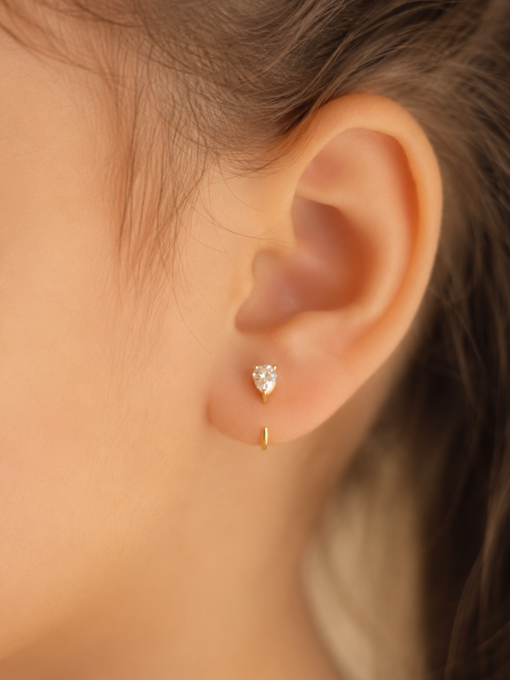 Solid 9kt gold pear hoop earrings for kids — real gold poke-free hypoallergenic hoops, naturally safe for sensitive skin and gentle enough to sleep in.