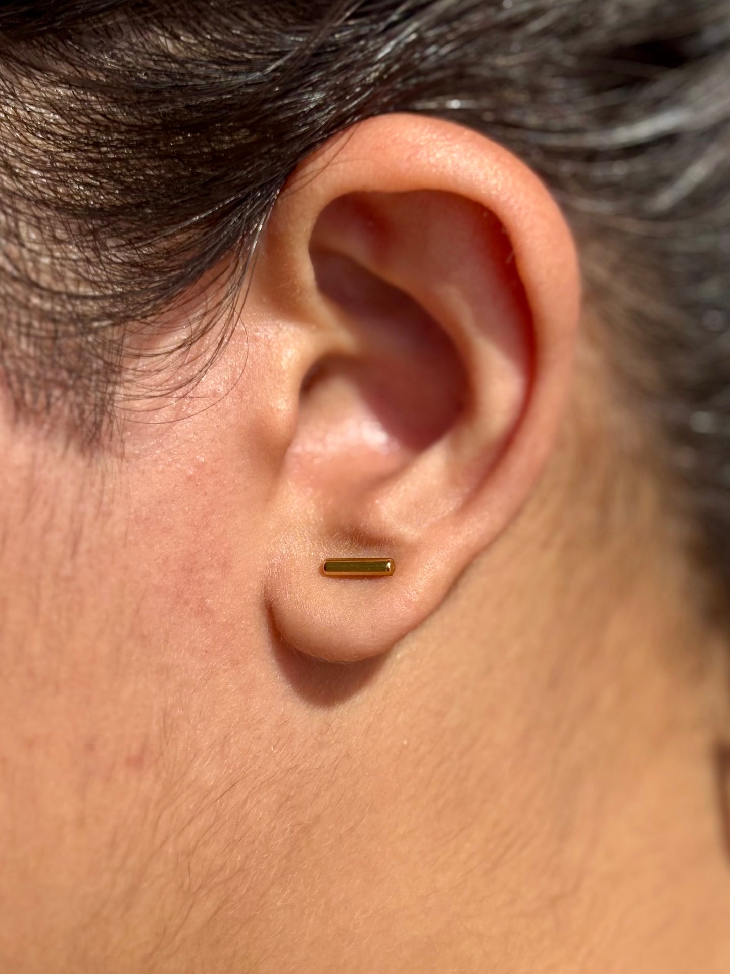 Pair of 18k gold-plated line studs — sleek minimal bar earrings for layered ear styling and evening looks.