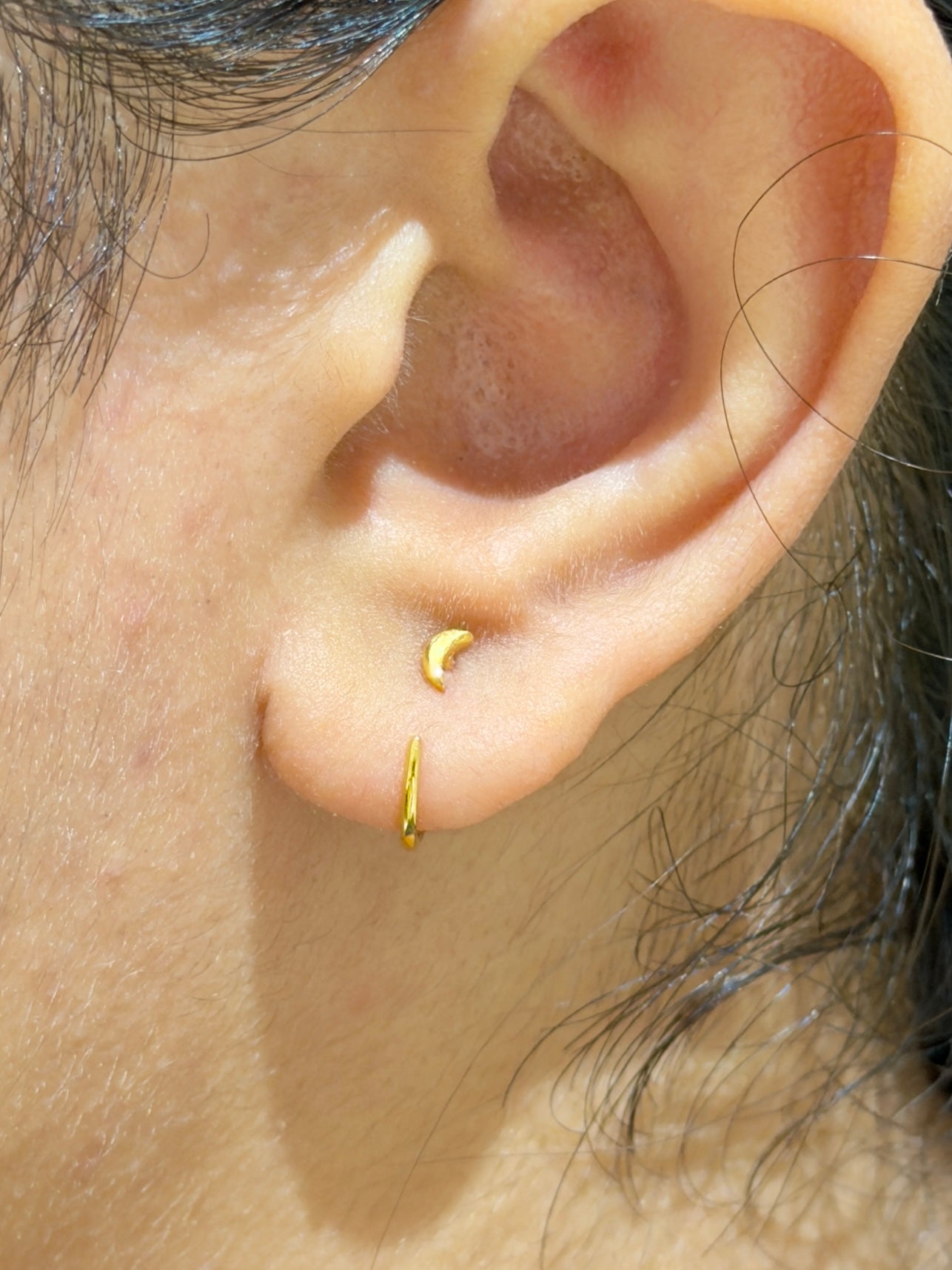 Styled view of 925 sterling silver moon earrings — poke-free celestial moon studs for everyday, evening, and sleep-safe wear.