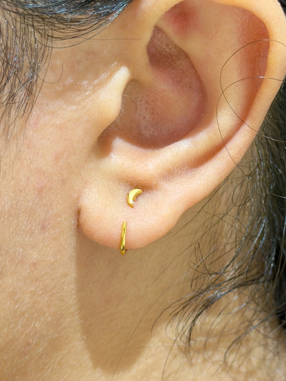 Styled view of 925 sterling silver moon earrings — poke-free celestial moon studs for everyday, evening, and sleep-safe wear.