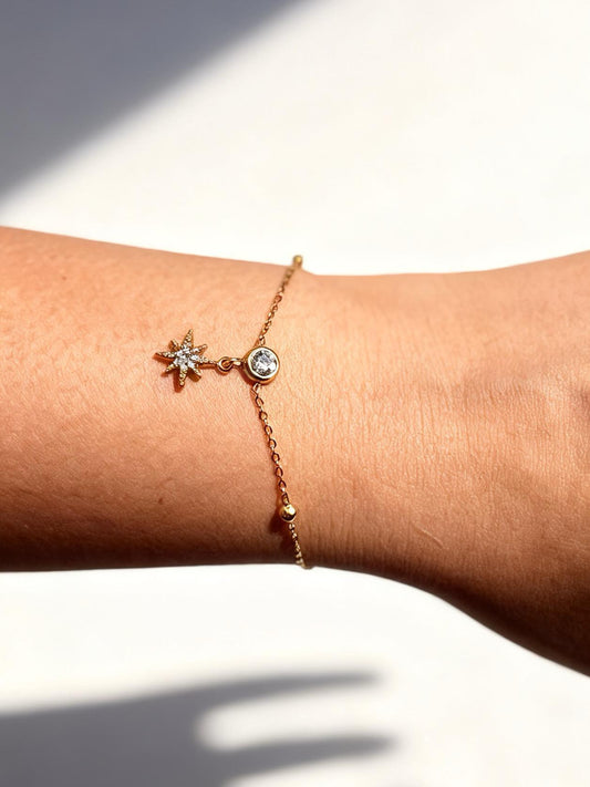 18k gold-plated star charm bracelet — minimal sleek layerable star bracelet, anti-tarnish and waterproof for everyday wear.