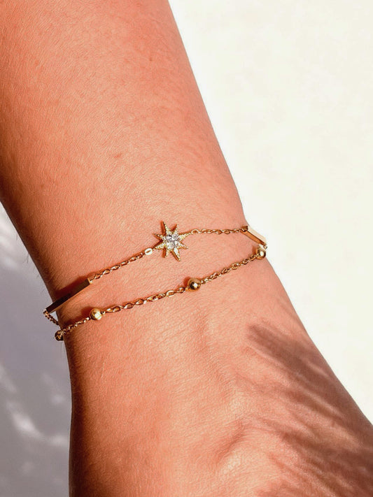 18k gold-plated sun layered bracelet — sleek sun-charm layerable bracelet, anti-tarnish and waterproof for everyday and casual wear.
