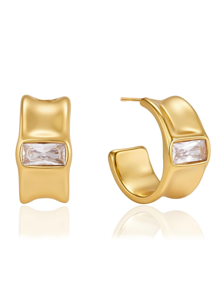 Pair of Rhea drop earrings — 18k gold-plated statement drops for evening and gifting.