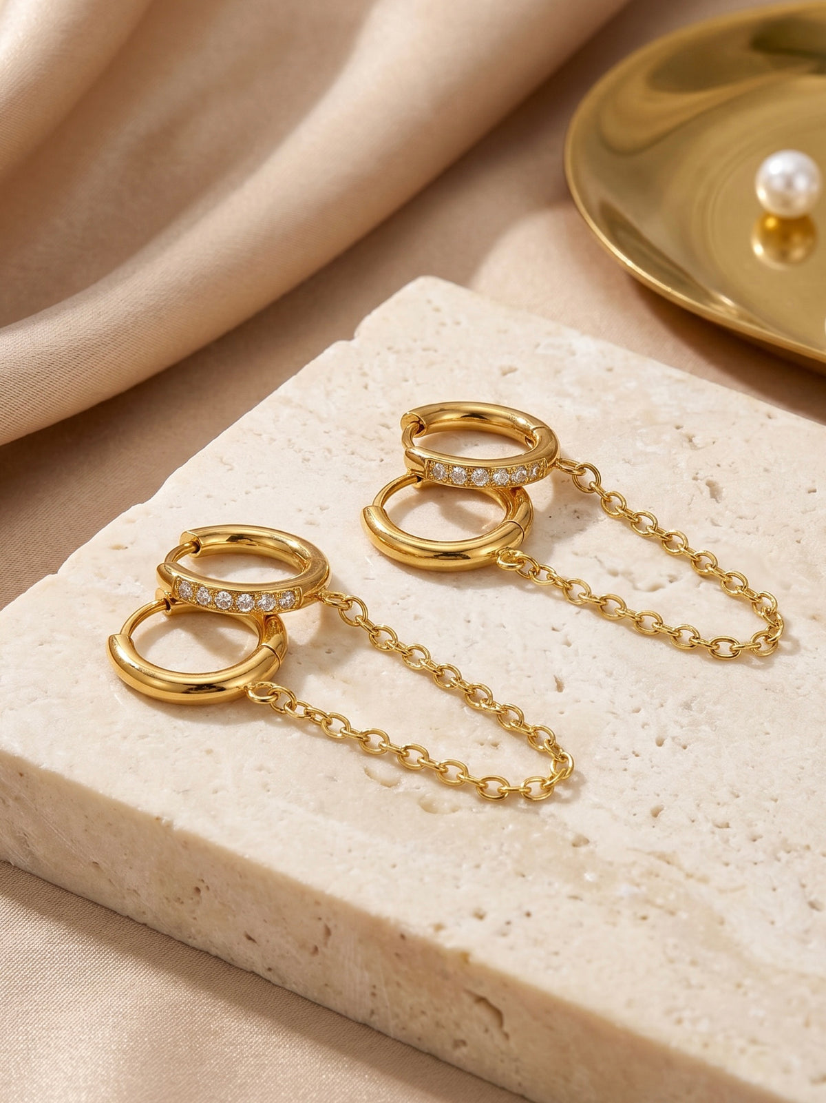 Pair of 18k gold-plated drop earrings — elegant statement drops for evening and gifting.