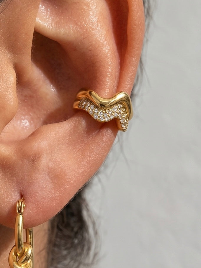 Close-up of 18k gold-plated ear cuff — sleek 18k gold-plated no-piercing single-piece cuff for daily wear.