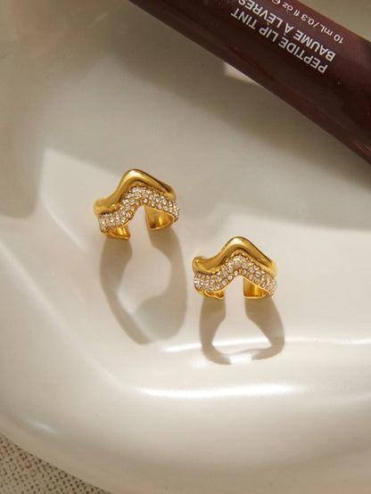 Styled view of 18k gold-plated ear cuff — sleek no-piercing single-piece cuff for festive ear stacks.