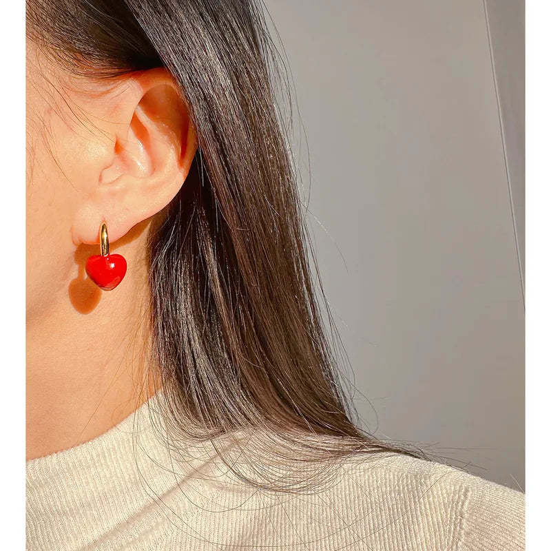 18k gold-plated red heart stone earrings — ruby-toned red heart drops, anti-tarnish and waterproof for festive, ethnic and party wear.