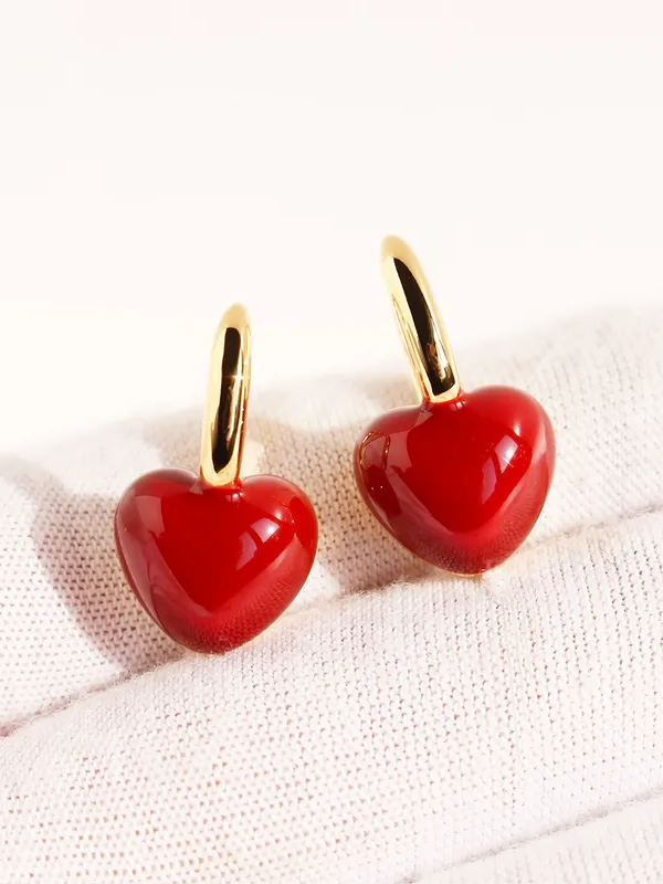 Pair of red heart stone earrings — 18k gold-plated ruby heart drops for festive and gifting.